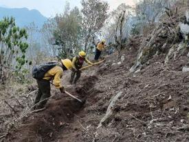 Con corte de las 19:00 hrs., se reporta un 95% de control y 80% de liquidaci�n en el incendio forestal registrado en Quimixtl�n gracias a la intervenci�n de los voluntarios, equipo a�reo y m�s  de 200 combatientes federales, estatales y municipales.