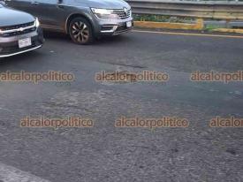 Emiliano Zapata, Ver., 26 de julio de 2026.- Múltiples baches se observan en el tramo carretero donde este domingo murió un motociclista.